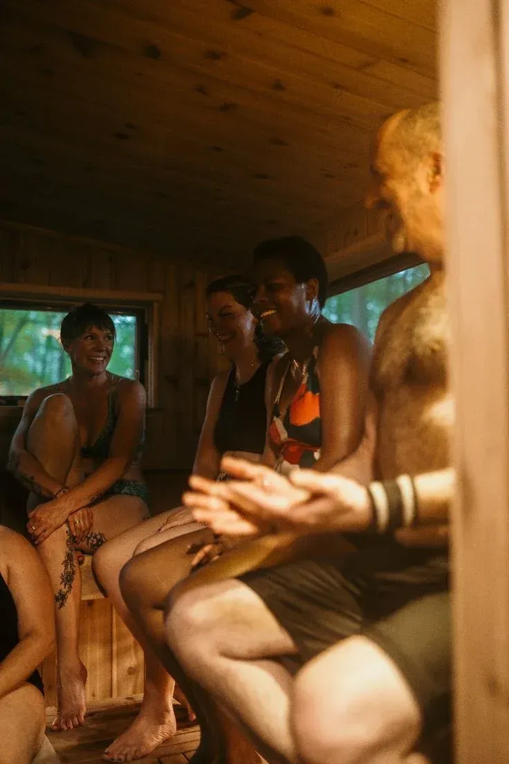 People enjoying a social sauna session